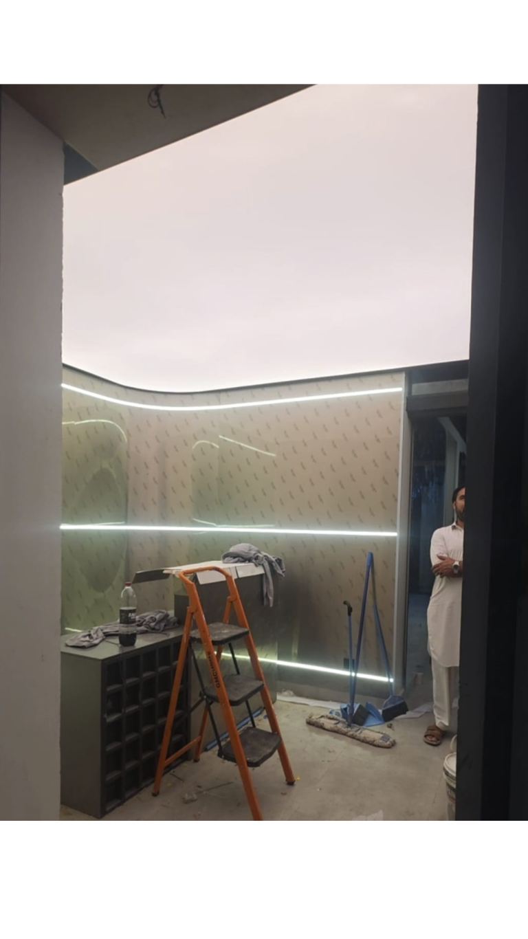 Completed warm white backlit Barrisol stretch fabric ceiling Newon