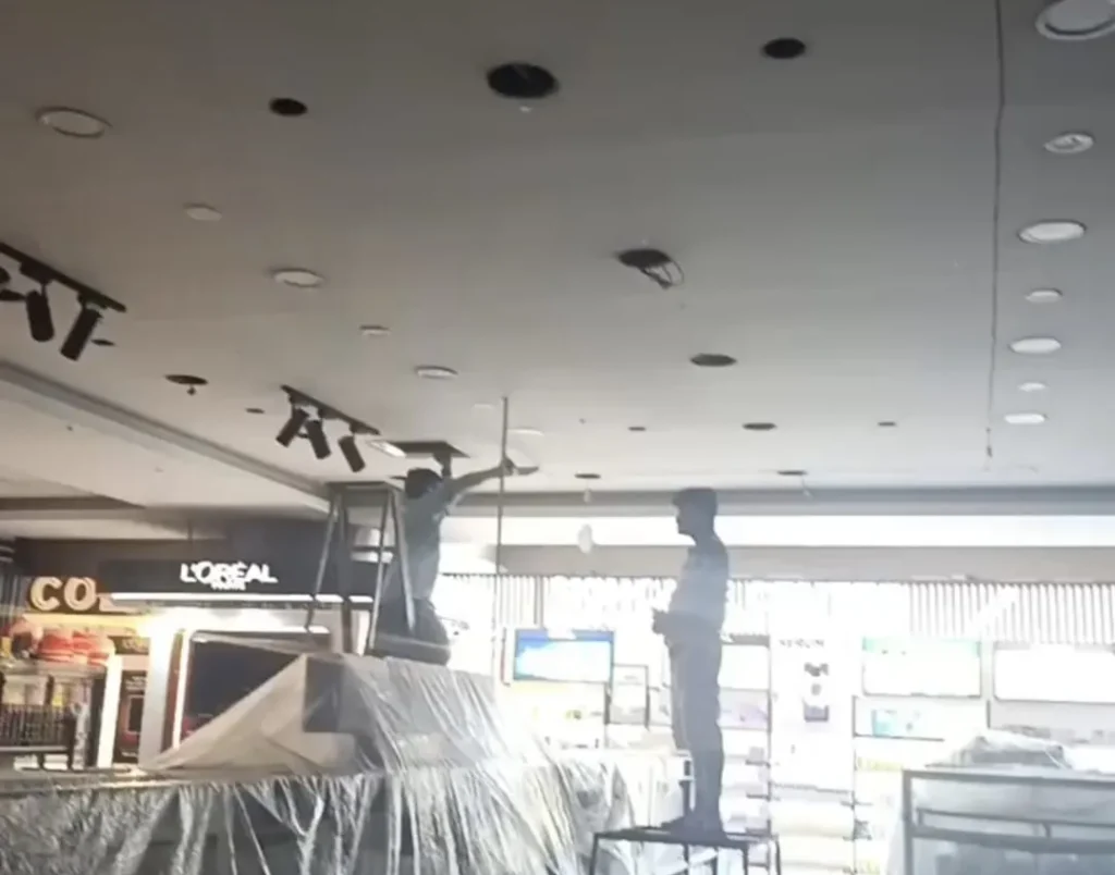Existing ceiling at Shaheen Cosmetics F-7 Islamabad before the backlit stretch fabric installation