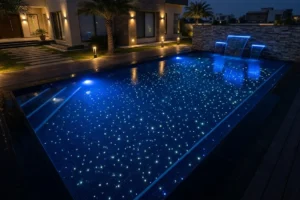 Fibre optic swimming pool star lighting installed by Newon Pakistan showing underwater starfield and RGB wash