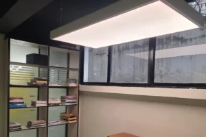 custom 2x4 ft suspended stretch fabric light box glowing uniformly above the collaborative workspace at Design Process Pvt Ltd Islamabad