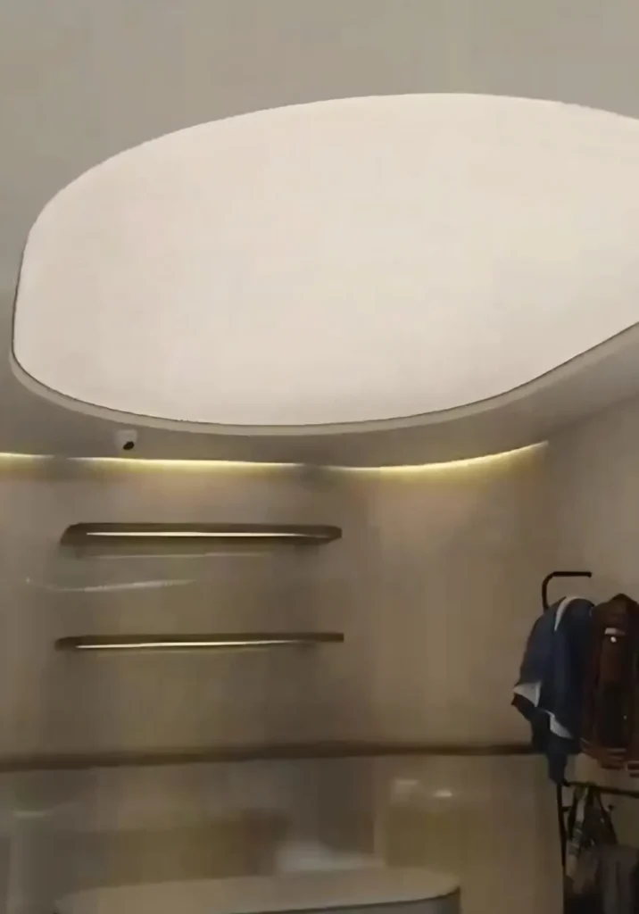 oval white plain backlit stretch fabric ceiling glowing over the Sapphire clothing store sales floor in F-10 Islamabad
