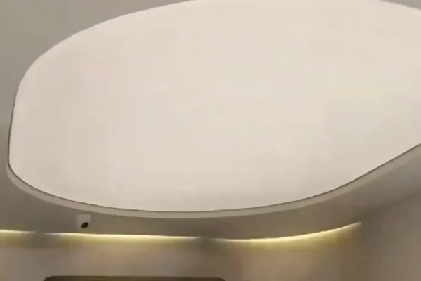 oval white plain backlit stretch fabric ceiling glowing over the Sapphire clothing store sales floor in F-10 Islamabad