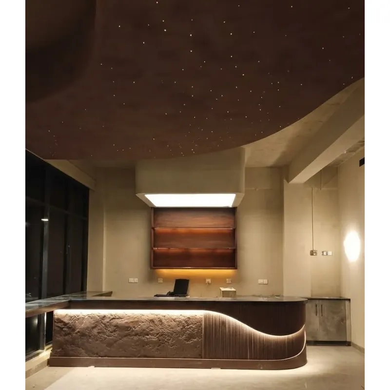custom stretch ceiling lightbox with curved edges and backlit translucent membrane above bar area by Newon Pakistan